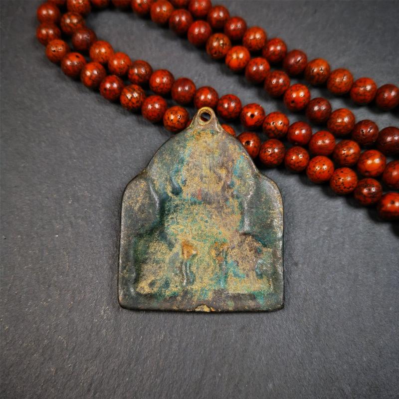 This chenrezig statue was made by Tibetan craftsmen. It is made of bronze, the top center is chenrezig, below are manjusri and vajrapani. You can make it as a amulet pendant, or put it into your shrine.