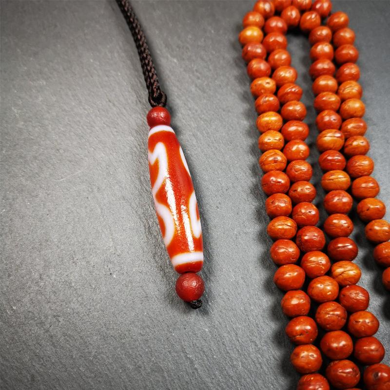 This vintage Lotus Dzi Bead is made of fire agate,new but high quality,size is 1.9" × 0.5". The lotus is the symbol of what is divine or immortal in humanity, and is also a symbol of divine perfection. The lotus is the attribute of sun and fire gods.