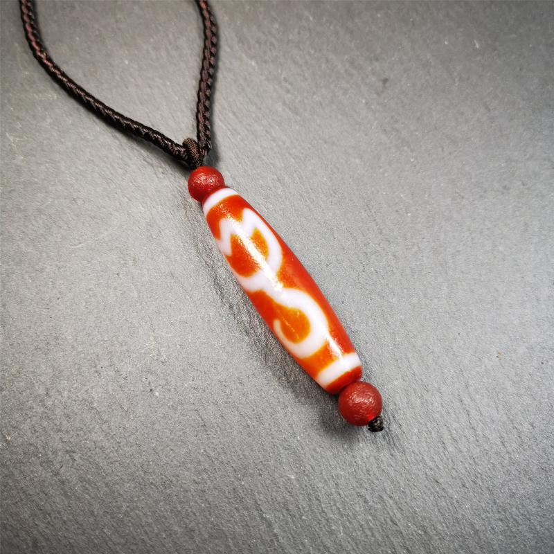 This vintage Lotus Dzi Bead is made of fire agate,new but high quality,size is 1.9" × 0.5". The lotus is the symbol of what is divine or immortal in humanity, and is also a symbol of divine perfection. The lotus is the attribute of sun and fire gods.