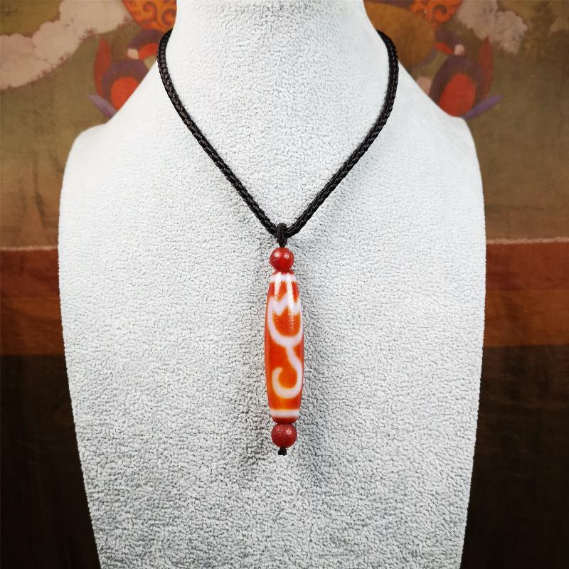 This vintage Lotus Dzi Bead is made of fire agate,new but high quality,size is 1.9" × 0.5". The lotus is the symbol of what is divine or immortal in humanity, and is also a symbol of divine perfection. The lotus is the attribute of sun and fire gods.
