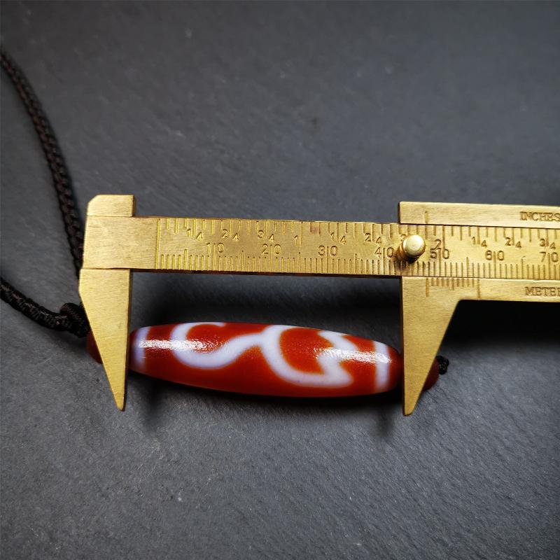 This vintage Lotus Dzi Bead is made of fire agate,new but high quality,size is 1.9" × 0.5". The lotus is the symbol of what is divine or immortal in humanity, and is also a symbol of divine perfection. The lotus is the attribute of sun and fire gods.