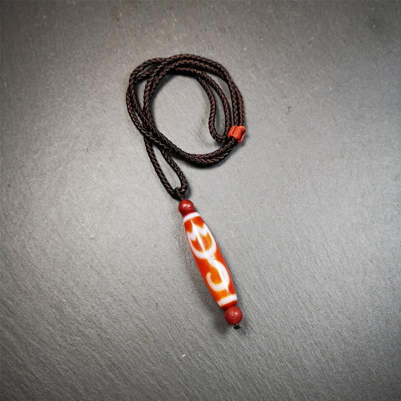 This vintage Lotus Dzi Bead is made of fire agate,new but high quality,size is 1.9" × 0.5". The lotus is the symbol of what is divine or immortal in humanity, and is also a symbol of divine perfection. The lotus is the attribute of sun and fire gods.