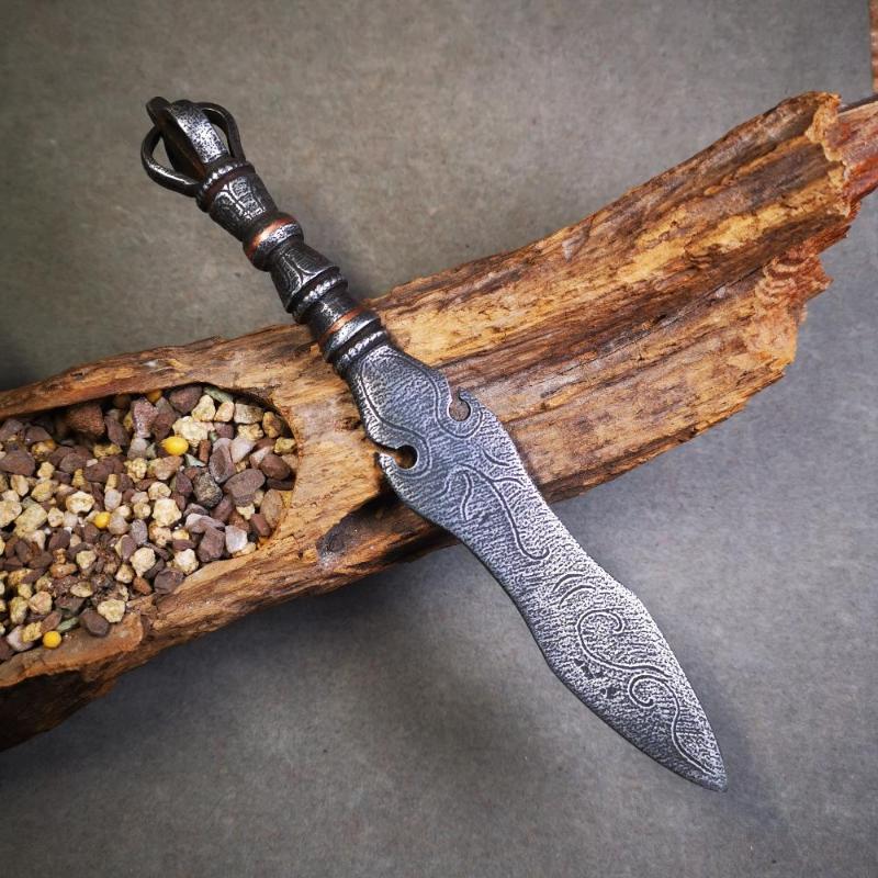 This phurba kila is handmade by Tibetan craftsmen from Tibet in 2000's,from Hepo Town, Baiyu County, the birthplace of the famous Tibetan handicrafts.  It's a kila dagger,made of cold iron, carved cloud pattern, inlaid red copper, and the half vajra on the handle,very delicate.