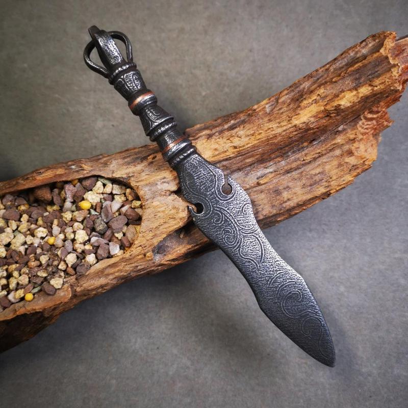 This phurba kila is handmade by Tibetan craftsmen from Tibet in 2000's,from Hepo Town, Baiyu County, the birthplace of the famous Tibetan handicrafts.  It's a kila dagger,made of cold iron, carved cloud pattern, inlaid red copper, and the half vajra on the handle,very delicate.