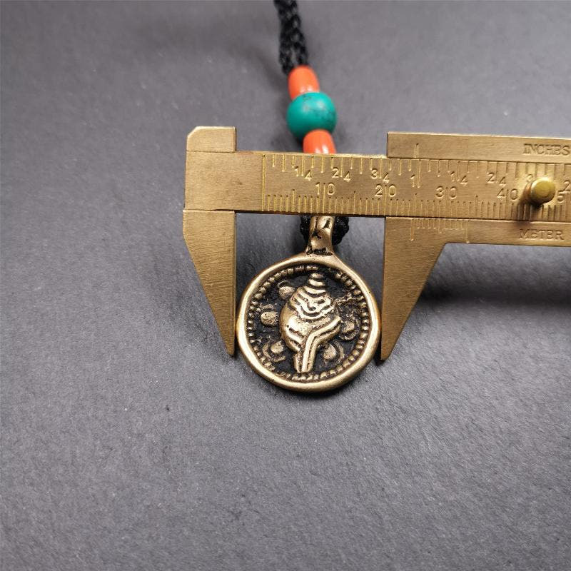 Conch Amulet 0.98" - Tibetan Buddhist amulet, size reference