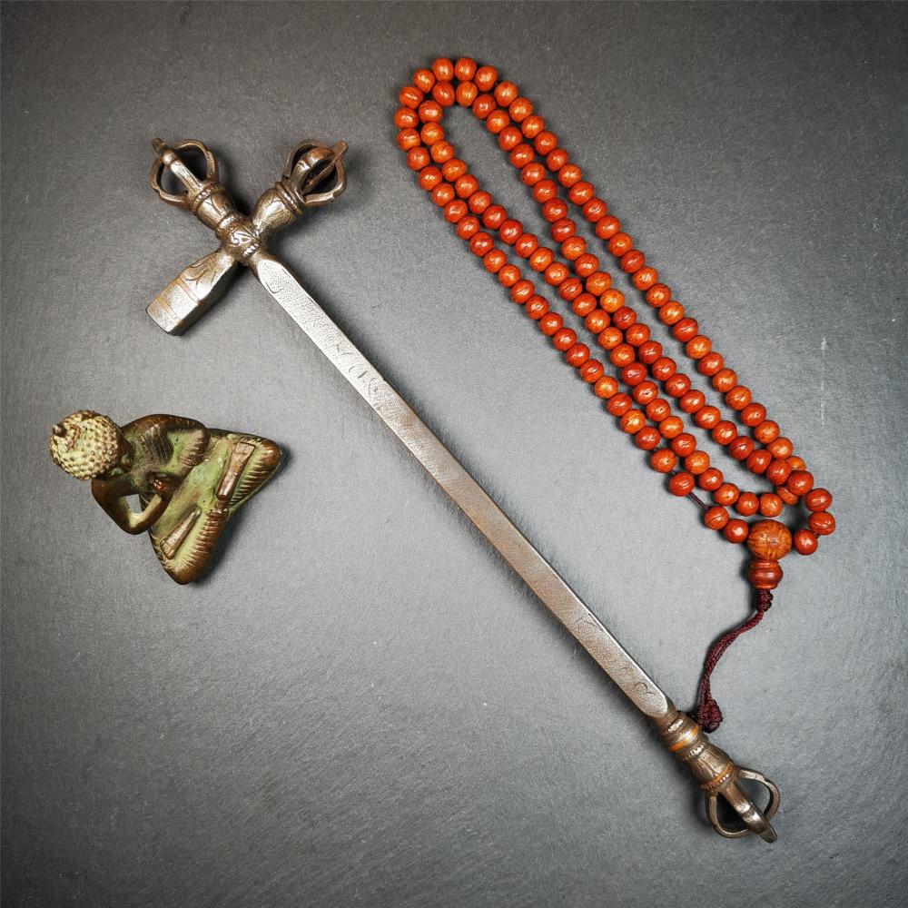 This vajra hammer was handmade by Tibetan craftsmen from Tibet in 1990's,from Hepo Town, Baiyu County, the birthplace of the famous Tibetan handicrafts. It is one ritual of dharma ritual implements,made of cold iron inlaid copper wire,size is 11.8 inches length.