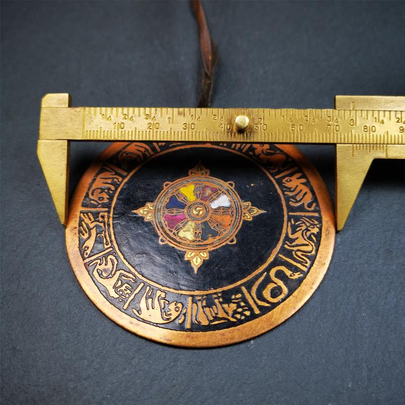 This beautiful prayer wheel badge was collected in Derge, Tibetan. It is made of brass, carved paryer wheel in the middle and Tibetan zodiac signs around it,then painted with color,size is 2.95". You can hang it at the door or in your shrine.