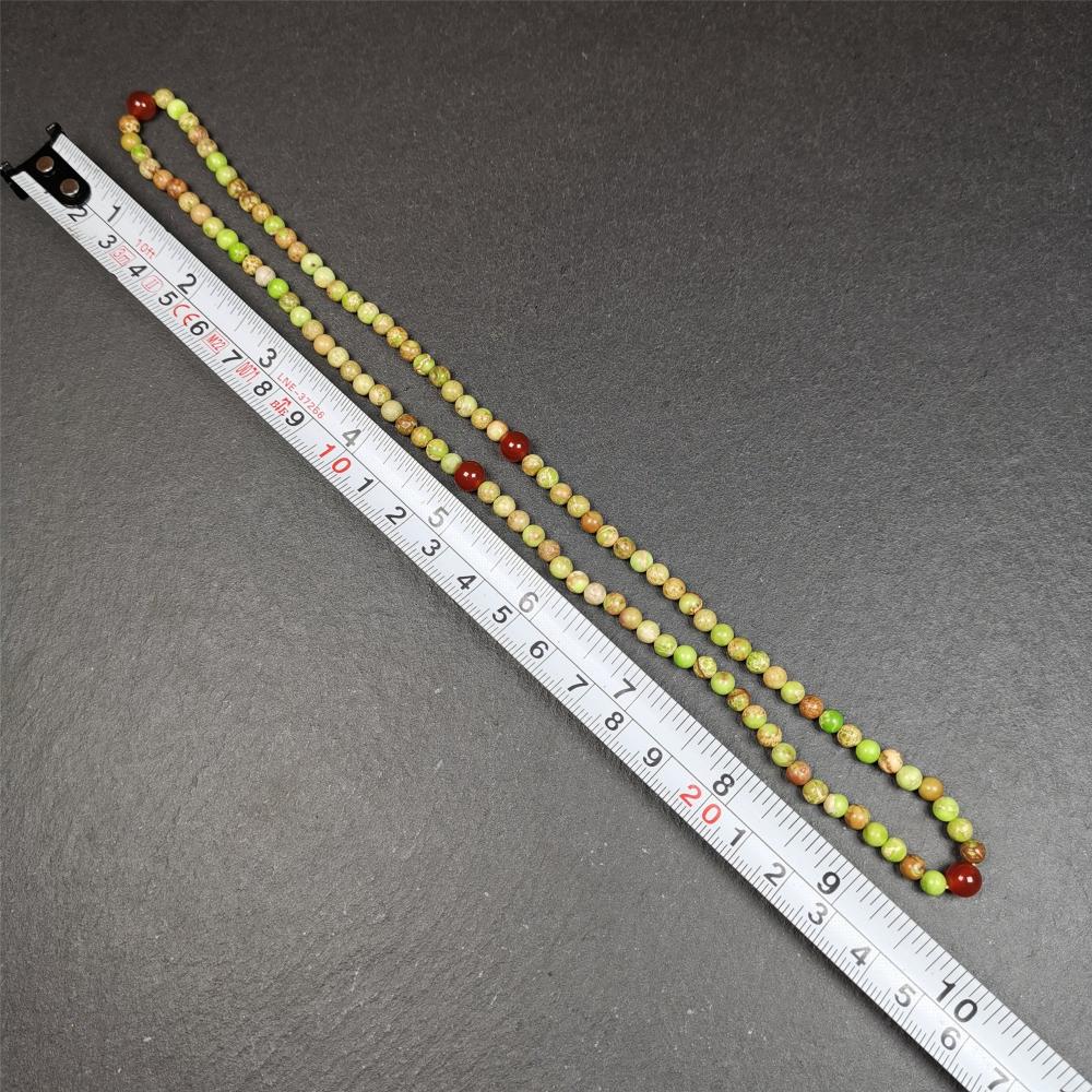 This small size turquoise mala was handmade from tibetan crafts man in Baiyu County. It's composed of 108 pcs 4mm turquoise beads, add 4 agate beads,string then with elastic cord and fit snugly around your wrist.