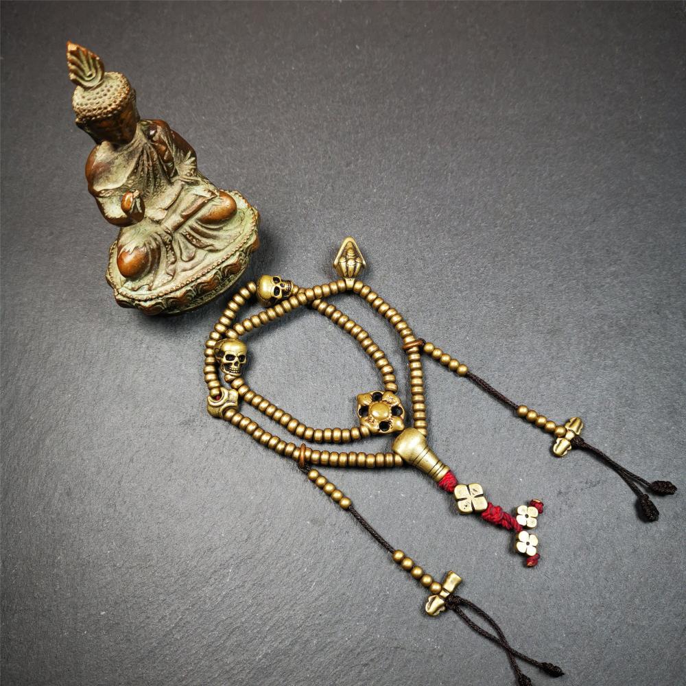 This mala was collect from Hepo Town Baiyu County Tibet 30 years ago, blessed in Yaqing Monastry. The necklace is made of lima brass, total 4 marker beads on it, and 1 set of bead counters ,very delicate and rare.
