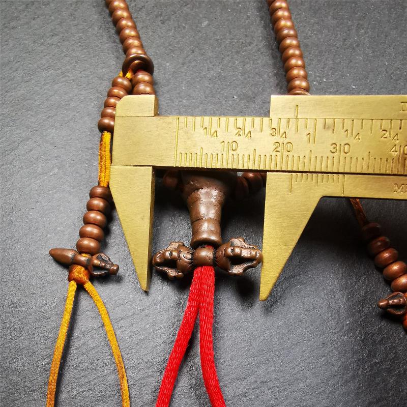 This mala was collect from Hepo Town Baiyu County Tibet, blessed in Yaqing Monastry. It is made of copper,brown color,length is 44cm / 18",has 1 Kartika ,2 skeletons, 2 stamp pendant, and 2 strings of counters with phurba + kartika.