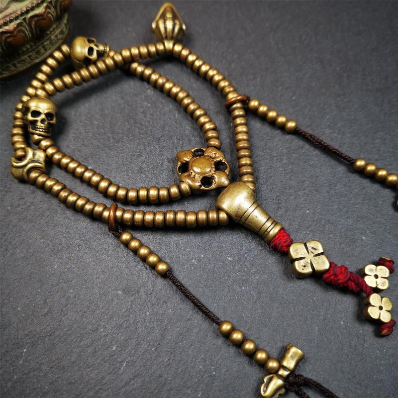 This mala was collect from Hepo Town Baiyu County Tibet 30 years ago, blessed in Yaqing Monastry. The necklace is made of lima brass, total 4 marker beads on it, and 1 set of bead counters ,very delicate and rare.