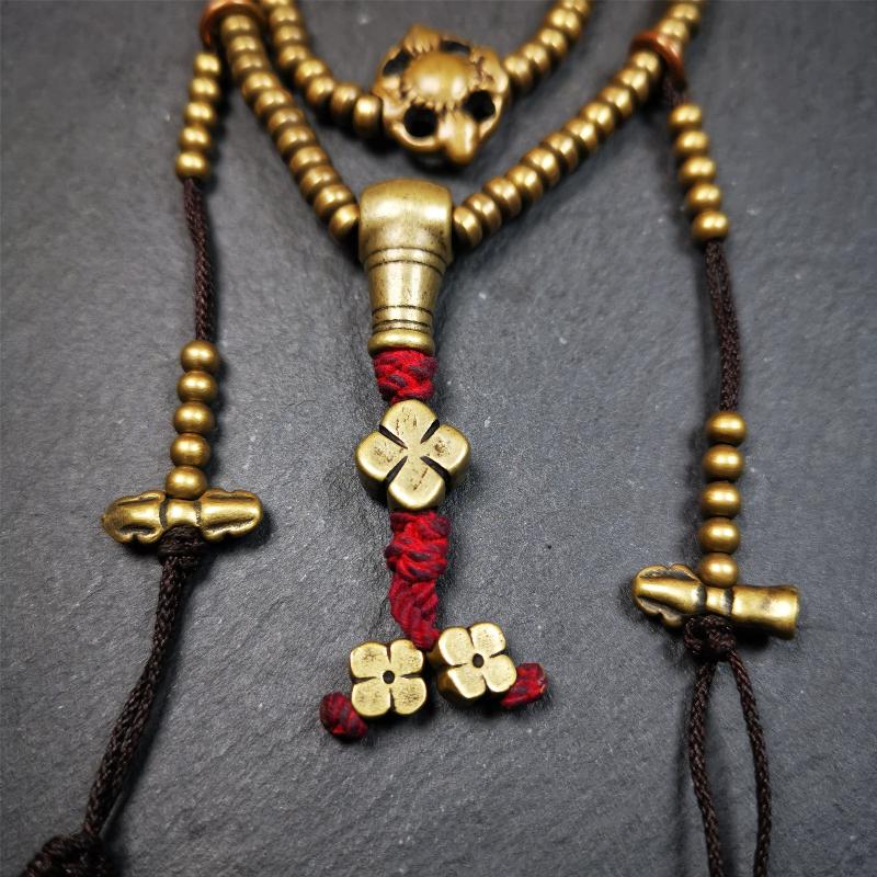 This mala was collect from Hepo Town Baiyu County Tibet 30 years ago, blessed in Yaqing Monastry. The necklace is made of lima brass, total 4 marker beads on it, and 1 set of bead counters ,very delicate and rare.