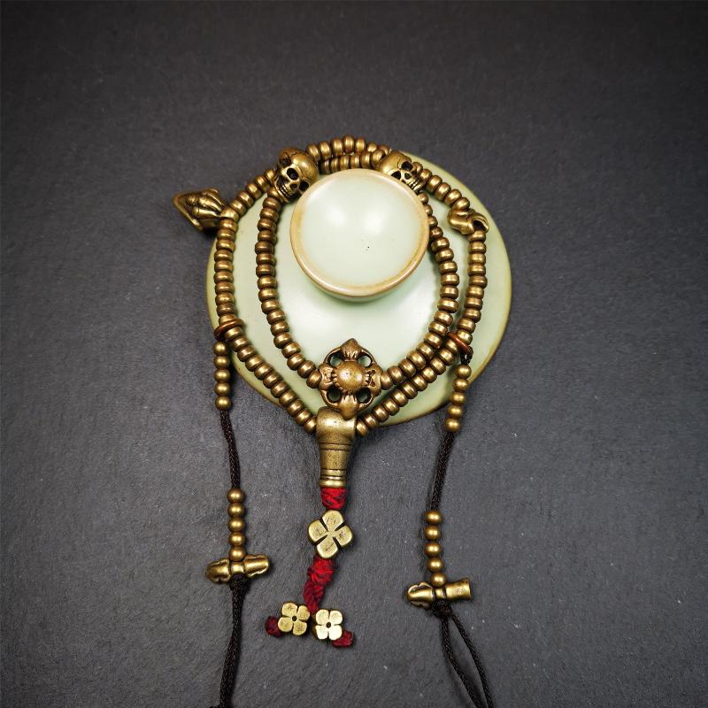 This mala was collect from Hepo Town Baiyu County Tibet 30 years ago, blessed in Yaqing Monastry. The necklace is made of lima brass, total 4 marker beads on it, and 1 set of bead counters ,very delicate and rare.
