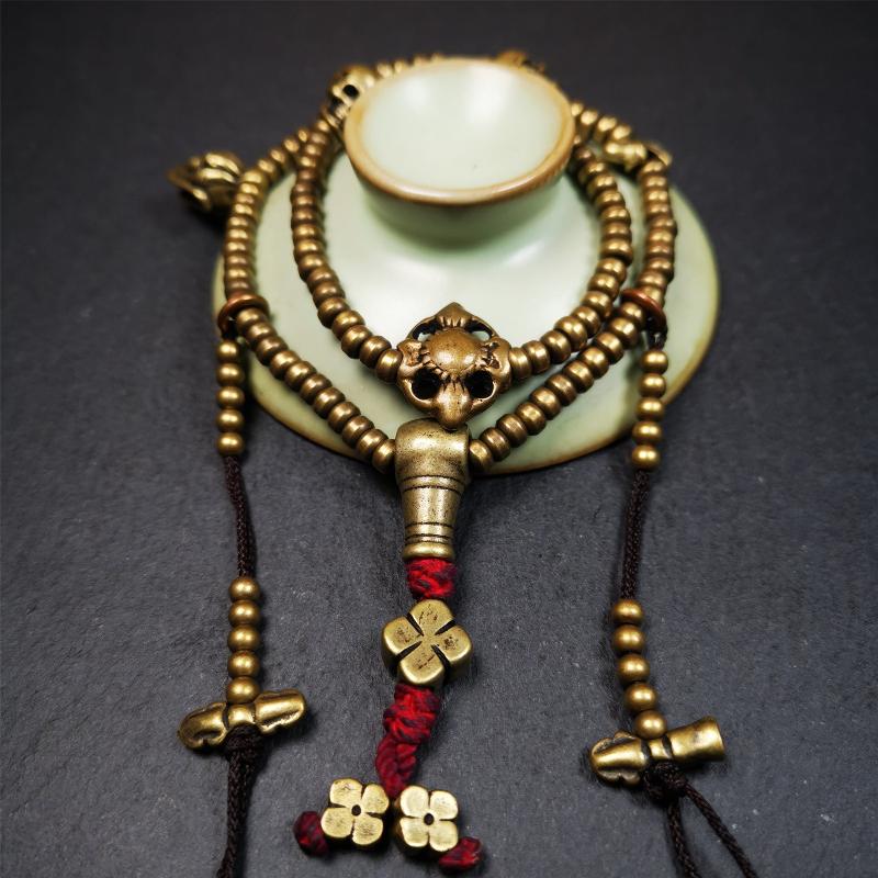 This mala was collect from Hepo Town Baiyu County Tibet 30 years ago, blessed in Yaqing Monastry. The necklace is made of lima brass, total 4 marker beads on it, and 1 set of bead counters ,very delicate and rare.