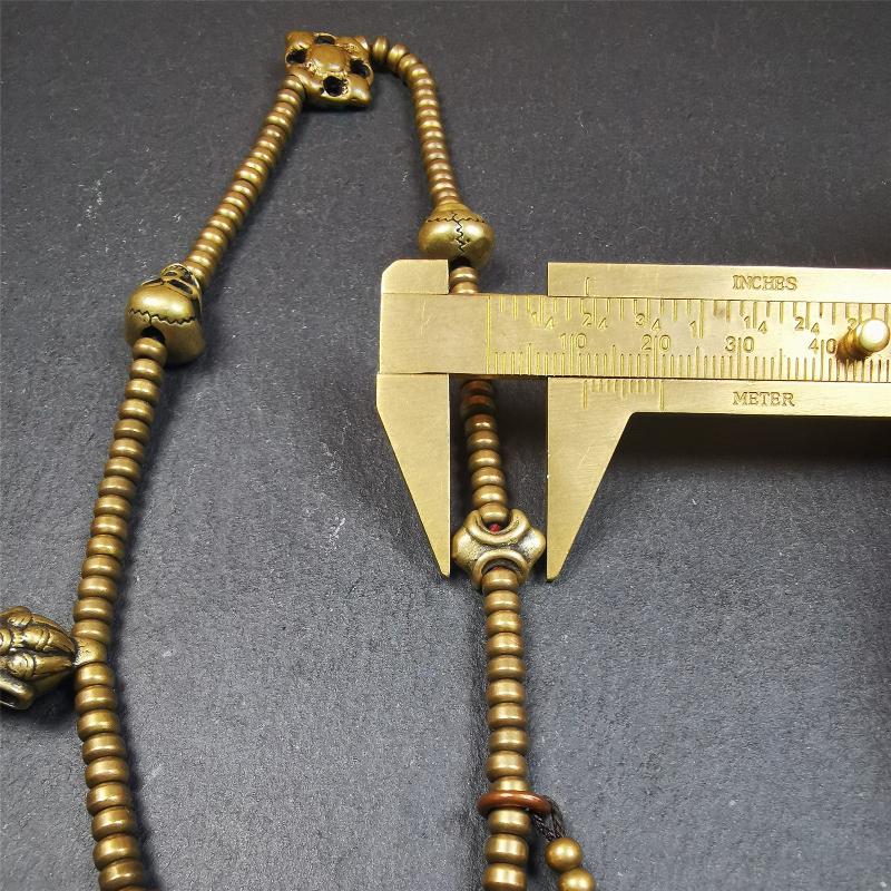 This mala was collect from Hepo Town Baiyu County Tibet 30 years ago, blessed in Yaqing Monastry. The necklace is made of lima brass, total 4 marker beads on it, and 1 set of bead counters ,very delicate and rare.