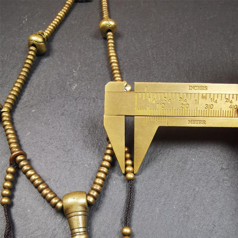 This mala was collect from Hepo Town Baiyu County Tibet 30 years ago, blessed in Yaqing Monastry. The necklace is made of lima brass, total 4 marker beads on it, and 1 set of bead counters ,very delicate and rare.
