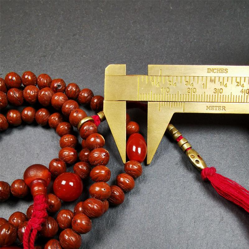 This old mala was collceted from Gerze Tibet.It is composed of 108 Indian jujube beads ,agate beads,and 1 pair of brass bead counters.