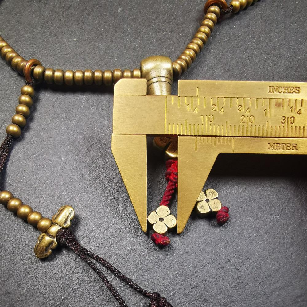 This mala was collect from Hepo Town Baiyu County Tibet 30 years ago, blessed in Yaqing Monastry. The necklace is made of lima brass, total 4 marker beads on it, and 1 set of bead counters ,very delicate and rare.
