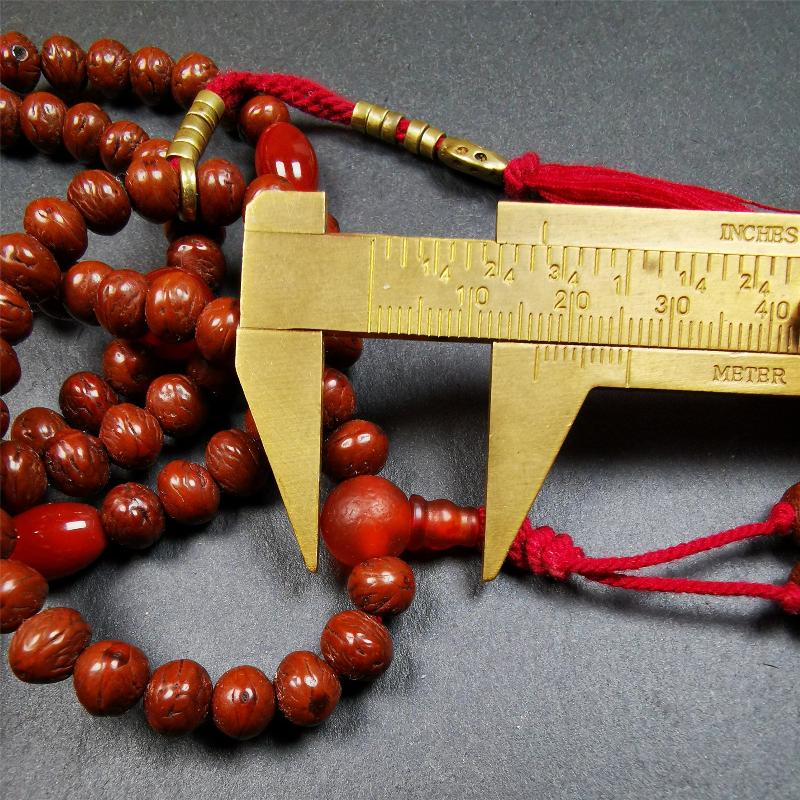 This old mala was collceted from Gerze Tibet.It is composed of 108 Indian jujube beads ,agate beads,and 1 pair of brass bead counters.