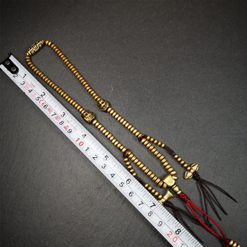 This mala was collect from Hepo Town Baiyu County Tibet 30 years ago, blessed in Yaqing Monastry. The necklace is made of lima brass, total 4 marker beads on it, and 1 set of bead counters ,very delicate and rare.