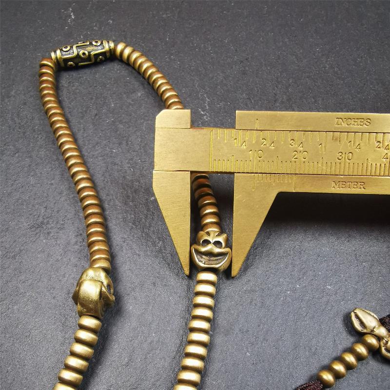 This mala was collect from Hepo Town Baiyu County Tibet 30 years ago, blessed in Yaqing Monastry. The necklace is made of lima brass, total 4 marker beads on it, and 1 set of bead counters ,very delicate and rare.