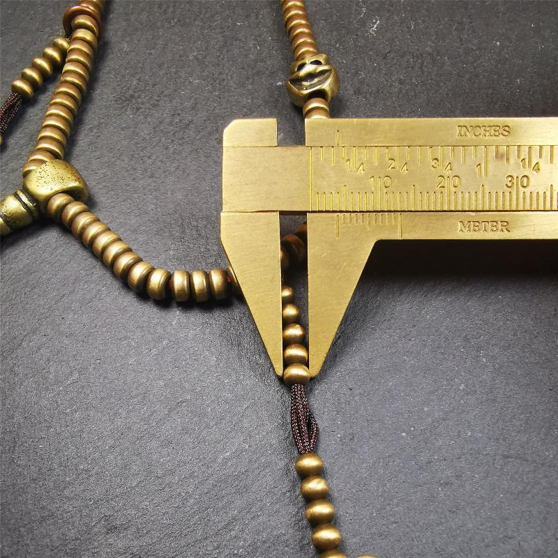 This mala was collect from Hepo Town Baiyu County Tibet 30 years ago, blessed in Yaqing Monastry. The necklace is made of lima brass, total 4 marker beads on it, and 1 set of bead counters ,very delicate and rare.