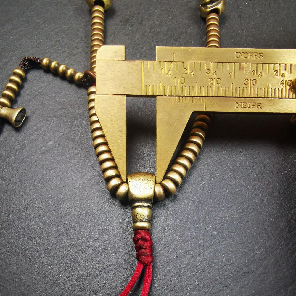 This mala was collect from Hepo Town Baiyu County Tibet 30 years ago, blessed in Yaqing Monastry. The necklace is made of lima brass, total 4 marker beads on it, and 1 set of bead counters ,very delicate and rare.