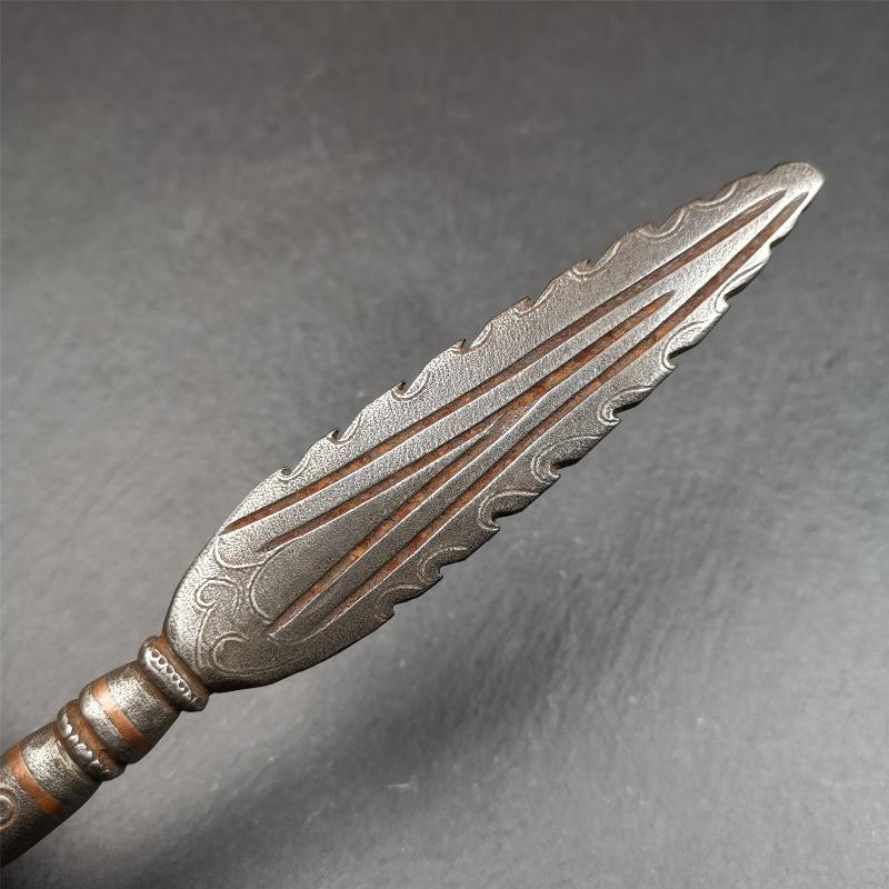 This vajra sword was handmade by Tibetan craftsmen from Tibet in 1990s. It's Fire Vajra Sword of Wisdom Buddha Manjushri,made of cold iron,inlaid red copper stripe,carved with flame pattern, and the half vajra at the tail,8.3 inches length.