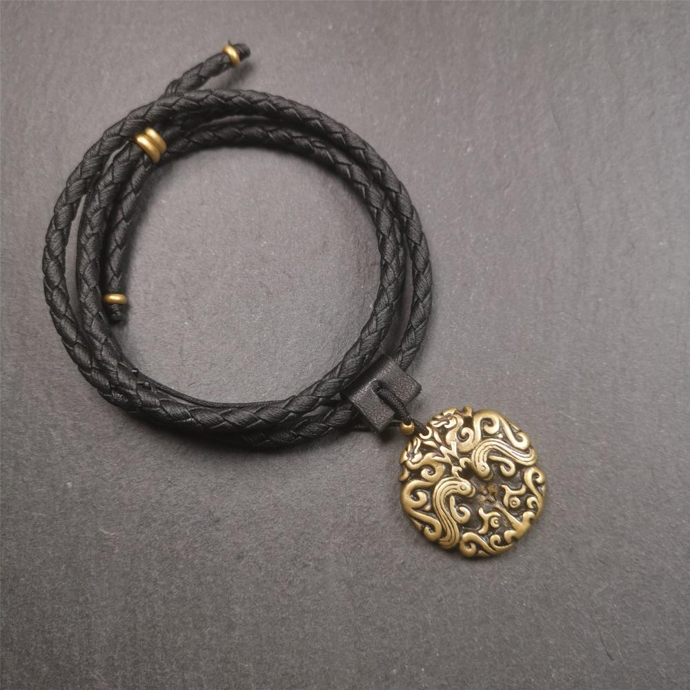 This Kirtimukha amulet was collected from Tibet, it is carved with a Kirtimukha totem,made of different materials,size is about 1.1 inch, very delicate. You can make it into a necklace, or a keychain, or just put it in your shrine.