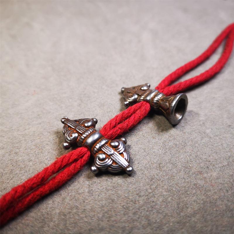This pair of vajra and bell pendant are made by Tibetan craftsmen and come from Hepo Town, Baiyu County, the birthplace of the famous Tibetan handicrafts. You can make it as a mala pendant below the guru bead, or spacer bead on mala. Also can be use as neckalce pendant or keychain.