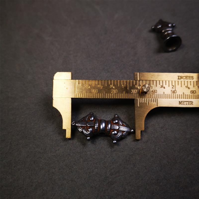 This pair of vajra and bell pendant are made by Tibetan craftsmen and come from Hepo Town, Baiyu County, the birthplace of the famous Tibetan handicrafts. You can make it as a mala pendant below the guru bead, or spacer bead on mala. Also can be use as neckalce pendant or keychain.