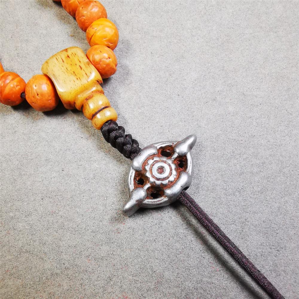 This unique cross vajra pendant was made by Tibetan craftsmen. You can use it as a spacer bead on mala,or pendant bead under guru bead. Also can be use as amulet pendant or keychain.