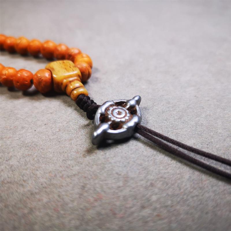 This unique cross vajra pendant was made by Tibetan craftsmen.  You can use it as a spacer bead on mala,or pendant bead under guru bead. Also can be use as amulet pendant or keychain.