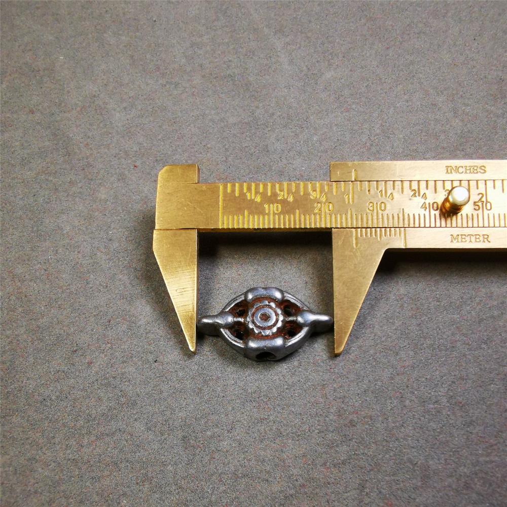 This unique cross vajra pendant was made by Tibetan craftsmen. You can use it as a spacer bead on mala,or pendant bead under guru bead. Also can be use as amulet pendant or keychain.