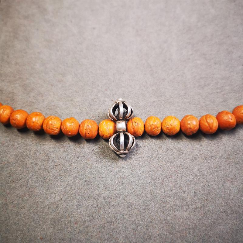 This unique sterling silver vajra pendant was made by Tibetan craftsmen in Hepo Township, Baiyu County, the birthplace of the famous Tibetan handicrafts. You can use it as a spacer bead on mala,or pendant bead under guru bead. Also can be use as amulet pendant or keychain.