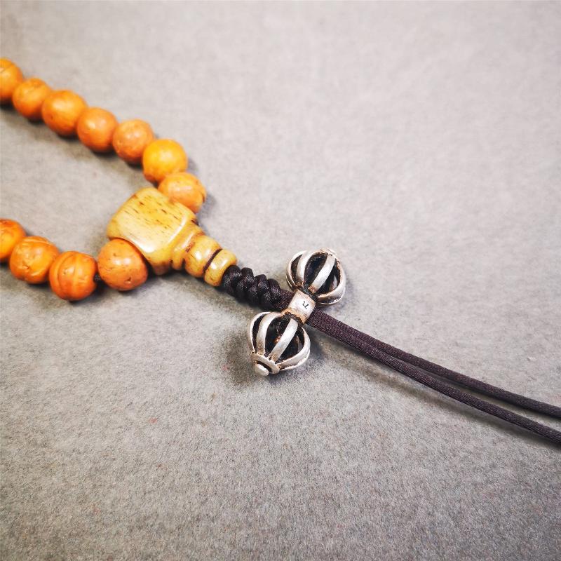 This unique sterling silver vajra pendant was made by Tibetan craftsmen in Hepo Township, Baiyu County, the birthplace of the famous Tibetan handicrafts. You can use it as a spacer bead on mala,or pendant bead under guru bead. Also can be use as amulet pendant or keychain.