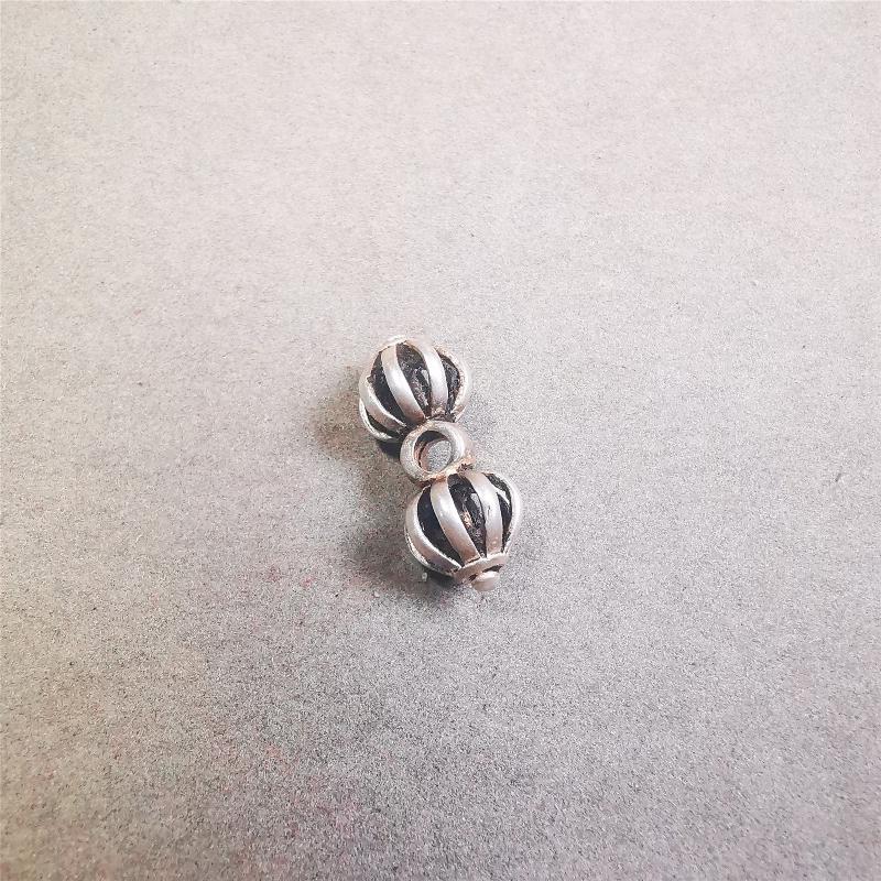 This unique sterling silver vajra pendant was made by Tibetan craftsmen in Hepo Township, Baiyu County, the birthplace of the famous Tibetan handicrafts. You can use it as a spacer bead on mala,or pendant bead under guru bead. Also can be use as amulet pendant or keychain.
