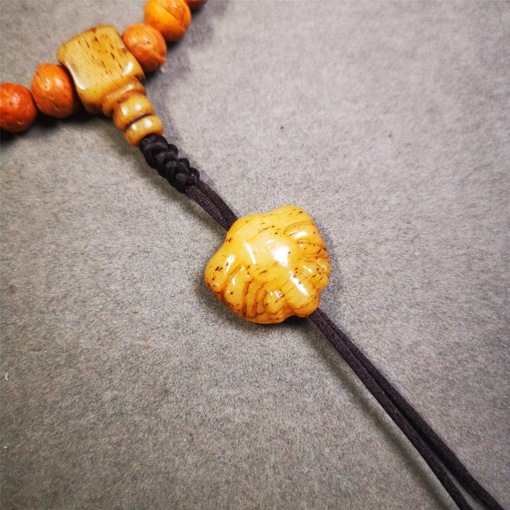 This unique bone carved scorpion pendant is made by Tibetan craftsmen. You can make it as a mala pendant below the guru bead, or spacer bead on mala. Also can be use as pendant or keychain.