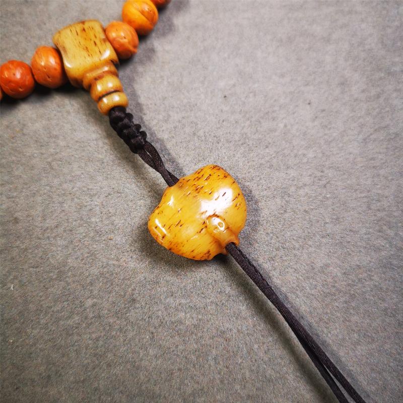 This unique bone carved scorpion pendant is made by Tibetan craftsmen. You can make it as a mala pendant below the guru bead, or spacer bead on mala. Also can be use as pendant or keychain.
