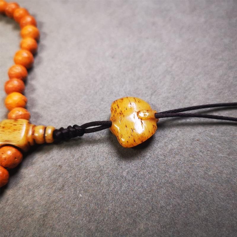 This unique bone carved scorpion pendant is made by Tibetan craftsmen. You can make it as a mala pendant below the guru bead, or spacer bead on mala. Also can be use as pendant or keychain.
