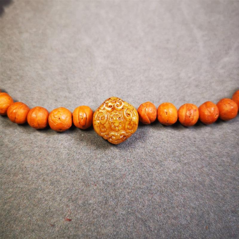 This unique bone carved lucky knot pendant is made by Tibetan craftsmen in Hepo Township, Baiyu County, the birthplace of the famous Tibetan handicrafts. You can make it as a mala pendant below the guru bead, or spacer bead on mala. Also can be use as pendant or keychain.
