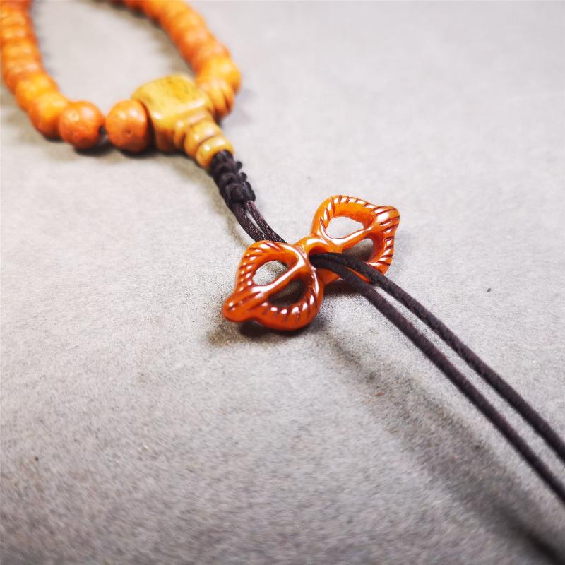 This unique bone carved vajra pendant is made by Tibetan craftsmen in Hepo Township, Baiyu County, the birthplace of the famous Tibetan handicrafts. You can make it as a mala pendant below the guru bead, or spacer bead on mala. Also can be use as pendant or keychain.
