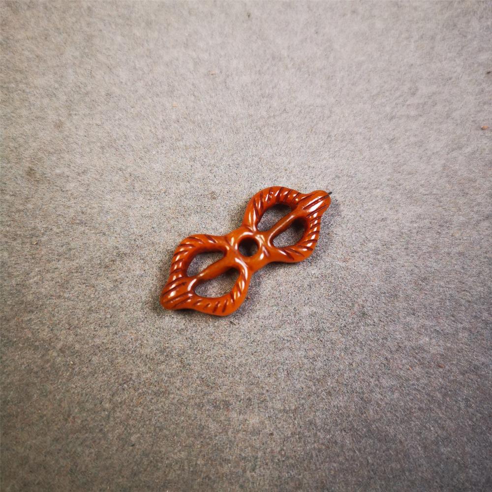 This unique bone carved vajra pendant is made by Tibetan craftsmen in Hepo Township, Baiyu County, the birthplace of the famous Tibetan handicrafts. You can make it as a mala pendant below the guru bead, or spacer bead on mala. Also can be use as pendant or keychain.