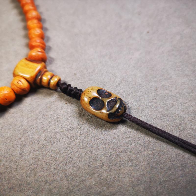 This unique bone carved Skull Sitavana pendant is made by Tibetan craftsmen in Hepo Township, Baiyu County, the birthplace of the famous Tibetan handicrafts. You can use it as a spacer bead on mala,or pendant bead under guru bead. Also can be use as pendant or keych