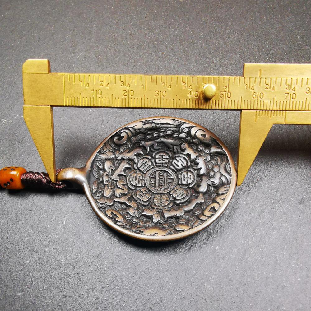 This unique tibetan melong badge was collected from Baiyu Monastery for 30 years. It's a Astrology Protective Amulet Pendant,made of cold iron. The pattern is Tibetan Budhist Protective Amulet Pendant - SIPAHO(srid pa ho).