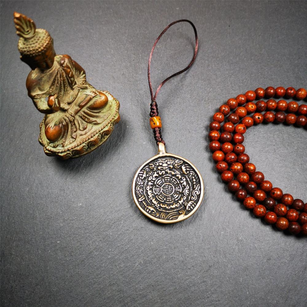 This unique tibetan calendar melong badge was collected from Baiyu Monastery for 30 years. It's a Astrology Protective Amulet Pendant,made of copper. The pattern is Tibetan Budhist Protective Amulet Pendant - SIPAHO(srid pa ho).