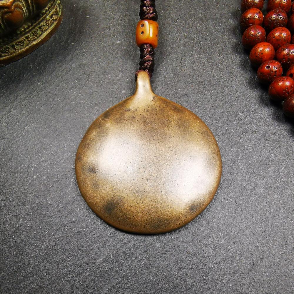 This unique tibetan calendar melong badge was collected from Baiyu Monastery for 30 years. It's a Astrology Protective Amulet Pendant,made of copper. The pattern is Tibetan Budhist Protective Amulet Pendant - SIPAHO(srid pa ho).