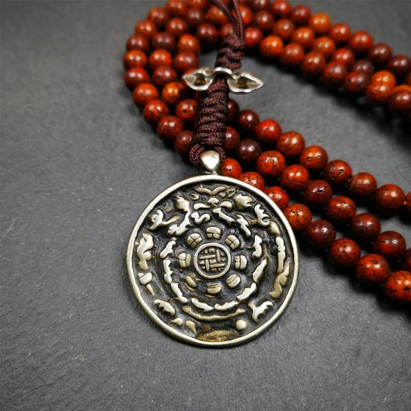 This unique tibetan melong badge was collected from Garzi Monastery for 20 years. It's a Astrology Protective Amulet Pendant,made of cold iron. The pattern is Tibetan Budhist Protective Amulet Pendant - SIPAHO(srid pa ho). SIPAHO Melong Amulet on the cord,when on a go or travelling, it's placed as a waist badge. You can make it into pendant,keychain, bag hanging,or just put it on your desk,as an ornament. The wearing of Srid-Pa-Ho heightens awareness, and protects body and mind from negative influences.