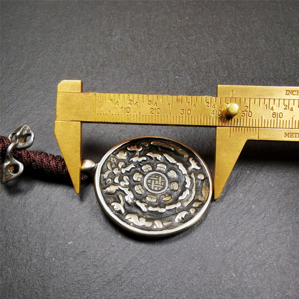 This unique tibetan melong badge was collected from Garzi Monastery for 20 years. It's a Astrology Protective Amulet Pendant,made of cold iron. The pattern is Tibetan Budhist Protective Amulet Pendant - SIPAHO(srid pa ho).  SIPAHO Melong Amulet on the cord,when on a go or travelling, it's placed as a waist badge. You can make it into pendant,keychain, bag hanging,or just put it on your desk,as an ornament. The wearing of Srid-Pa-Ho heightens awareness, and protects body and mind from negative influences.