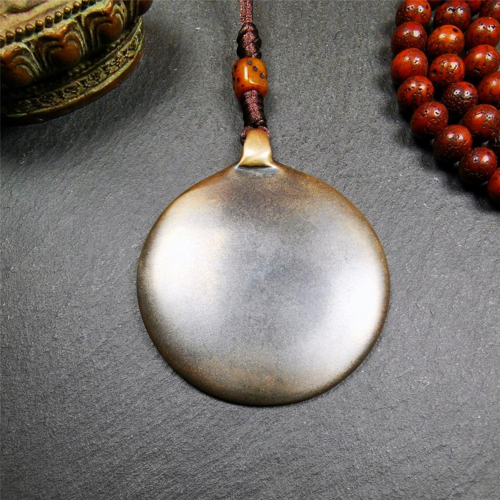 This unique tibetan melong badge was collected from Baiyu Monastery for 30 years. It's a Astrology Protective Amulet Pendant,made of cold iron. The pattern is Tibetan Budhist Protective Amulet Pendant - SIPAHO(srid pa ho).